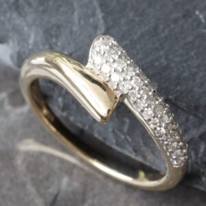 0.20ctw Pave Dome Cross Over Band