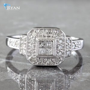 0.25CTW Four Princess Cluster Center with Cushion Halo Ring