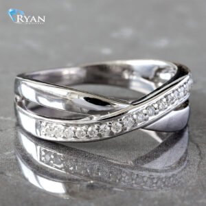0.25CTW Natural Round Diamond Cross Over White Gold Band