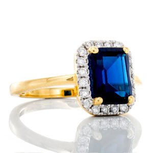 Emerald Cut Blue Sapphire with 0.25ctw Diamond Halo Ring
