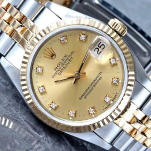 Rolex Datejust 31 Factory Champagne Diamond Dial 18K Gold Fluted Bezel and Jubilee Bracelet Watch